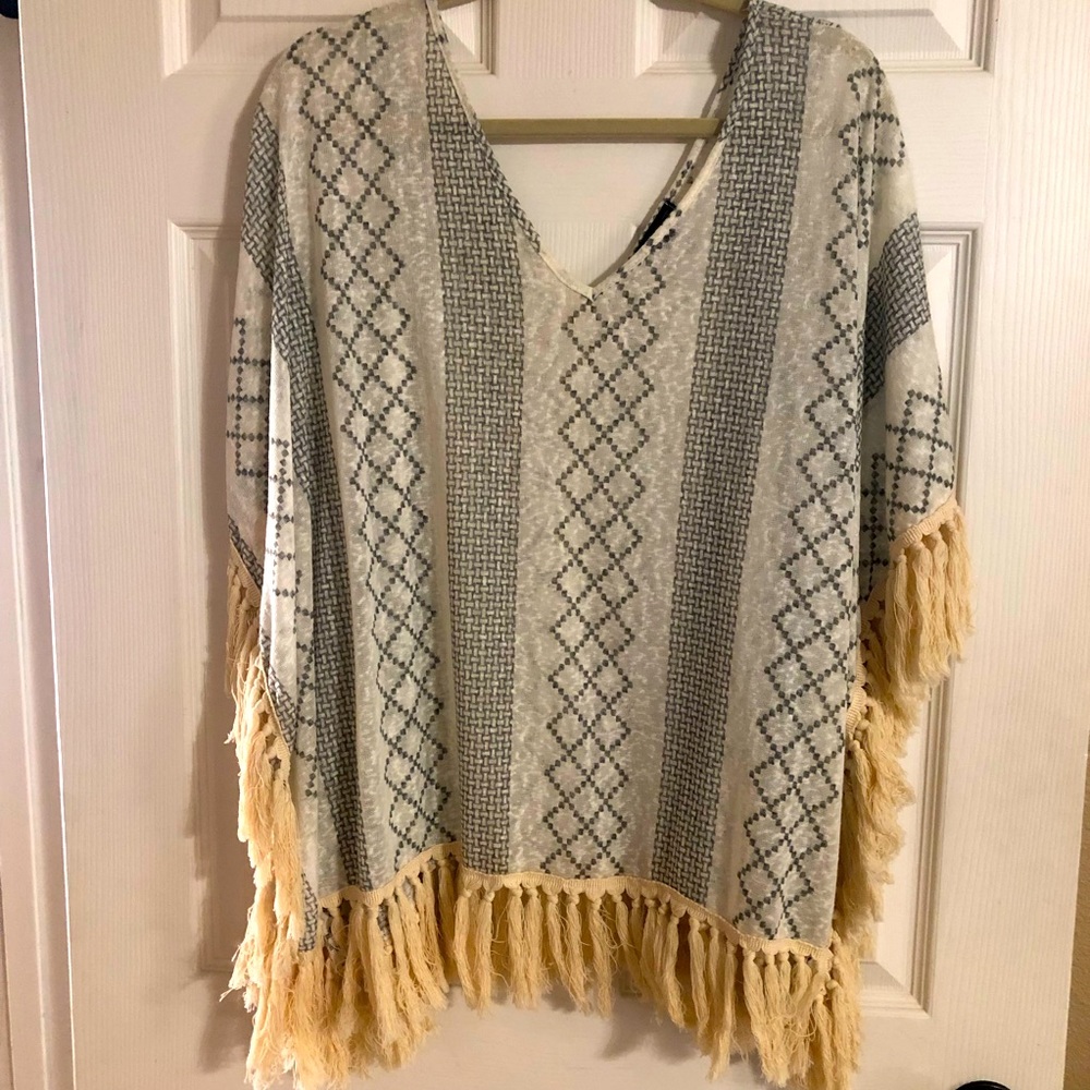 Women’s poncho with tassels size Large